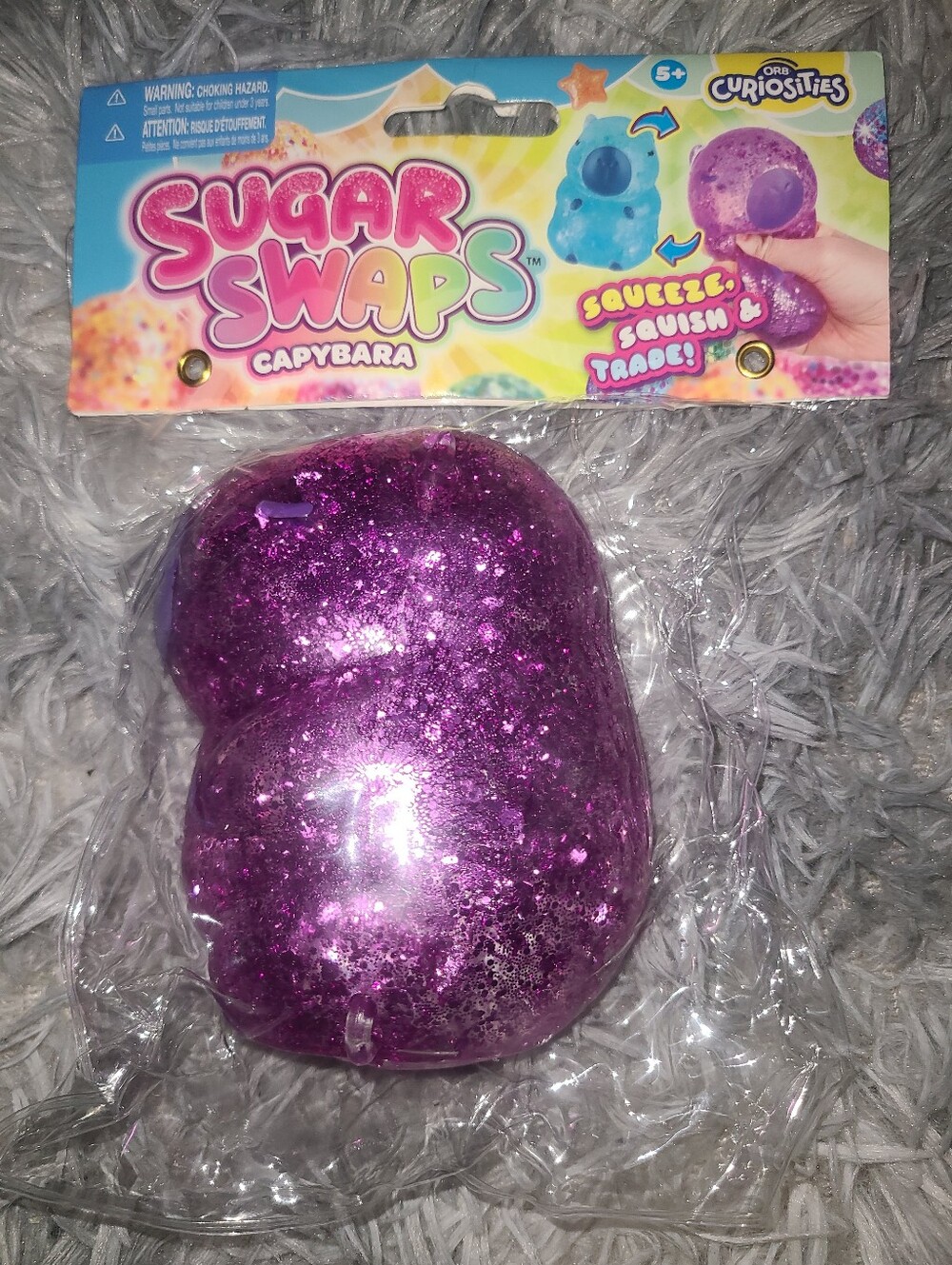 Unopened Sugar Swap Capybara Glitter Squishy Toy - Purple